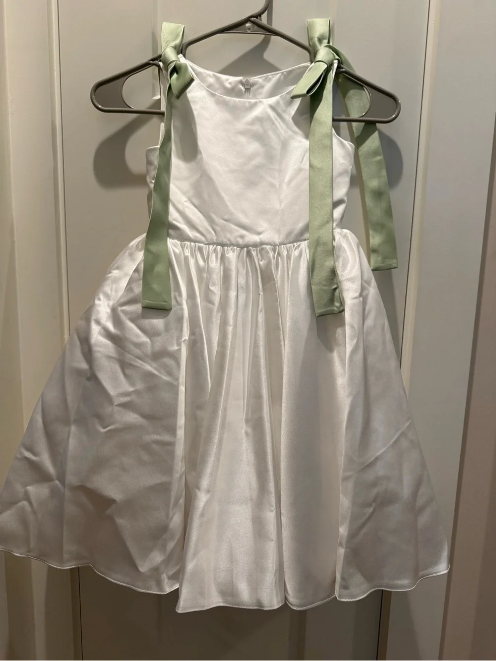 JJs House White Satin Flower Girl Dress with Sage Green Shoulder Ties
